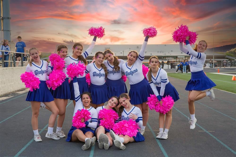 cheerleaders against sunset